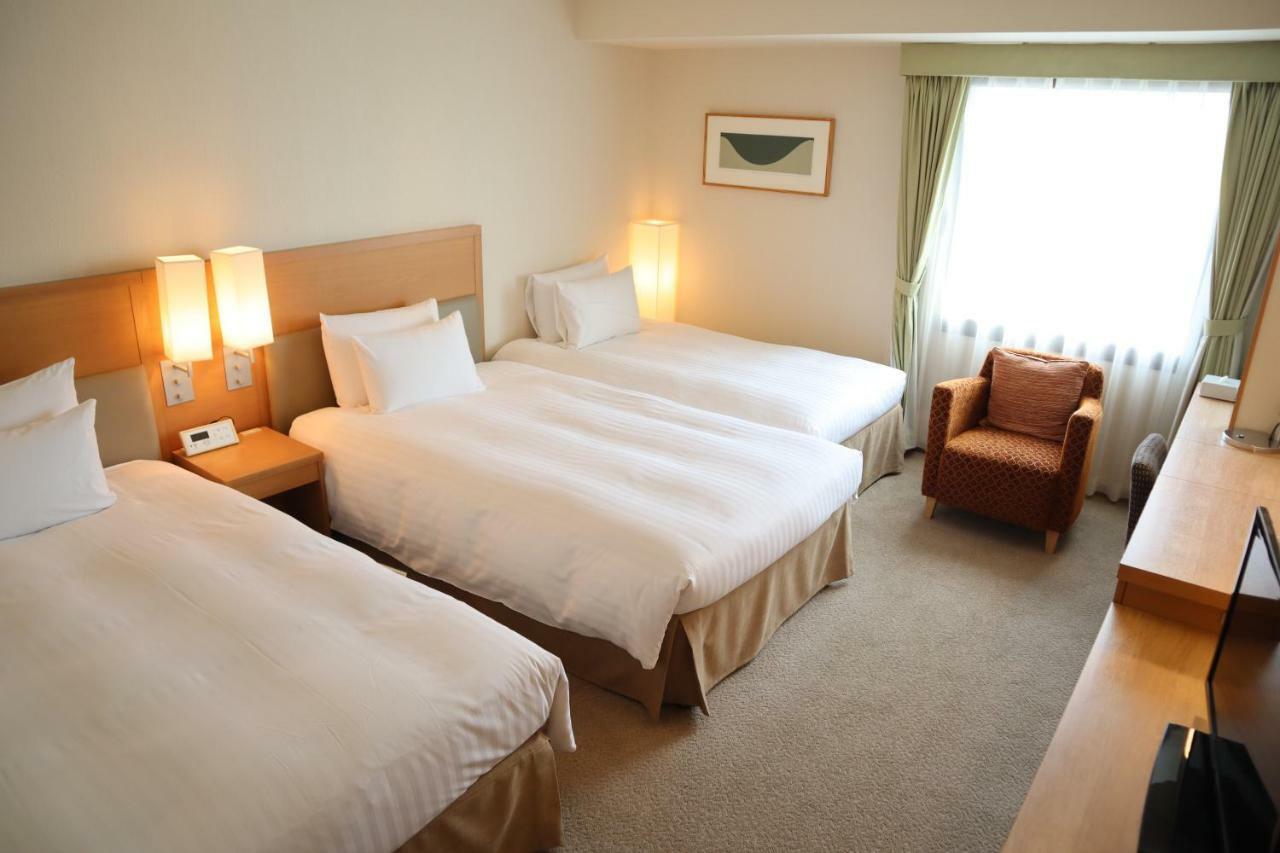 호텔 아소시아 시즈오카 외부 사진 A typical room at the hotel